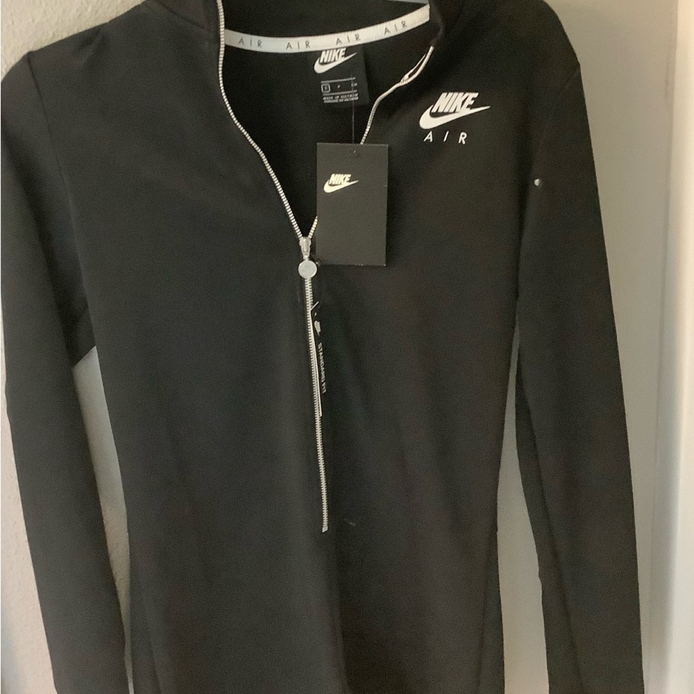 New with tags. Nike Air Black one piece sportstech workout romper. Size Small